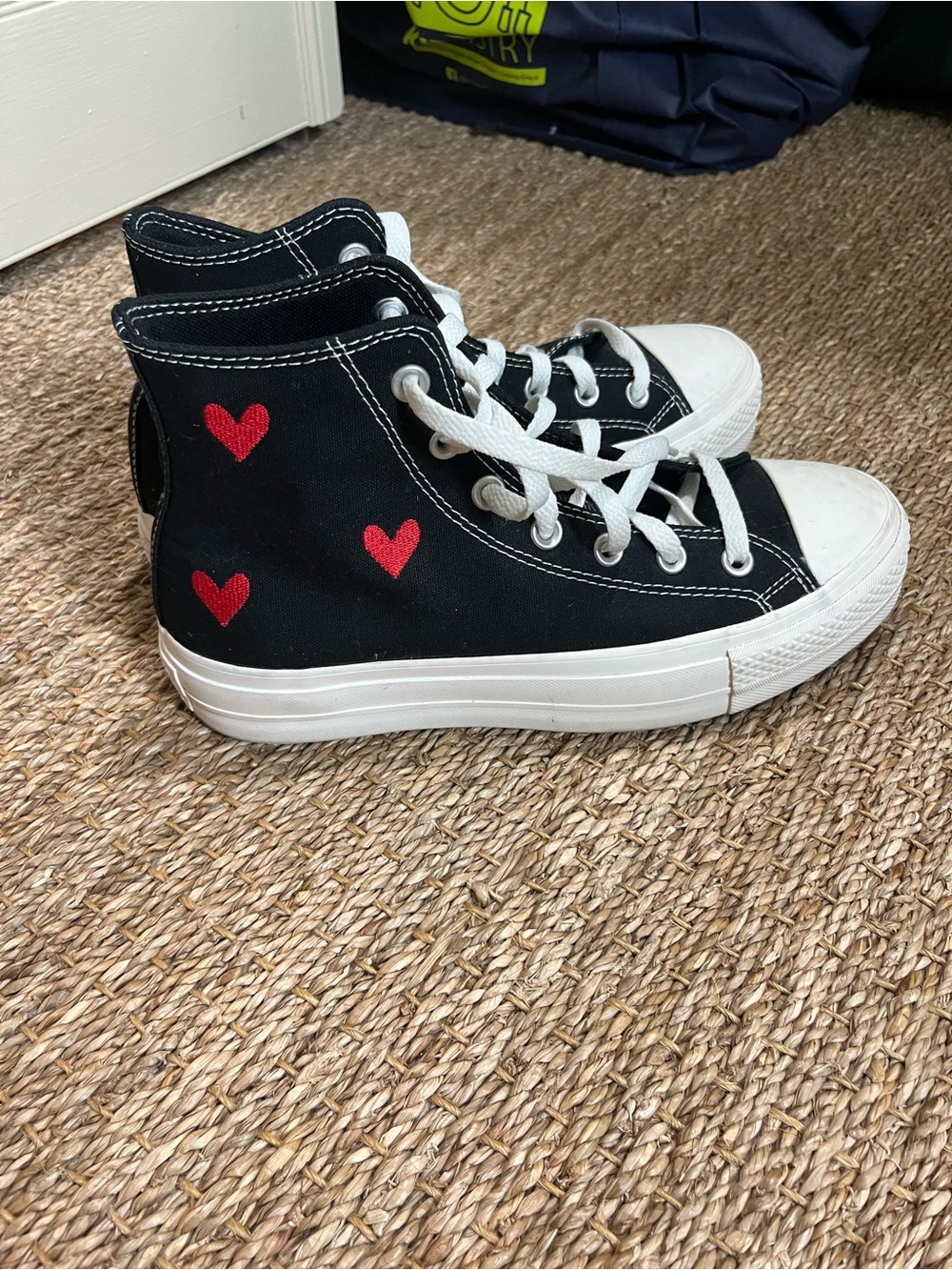 Converse Black High-Top Sneakers with Red Heart Accents